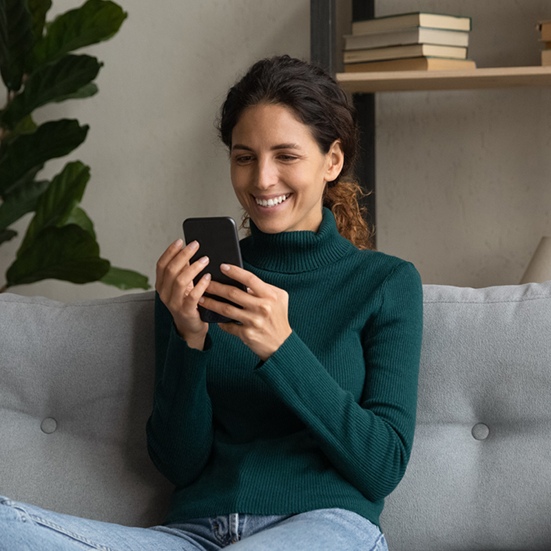 Woman checking insurance coverage with Brent Young Agency LLC